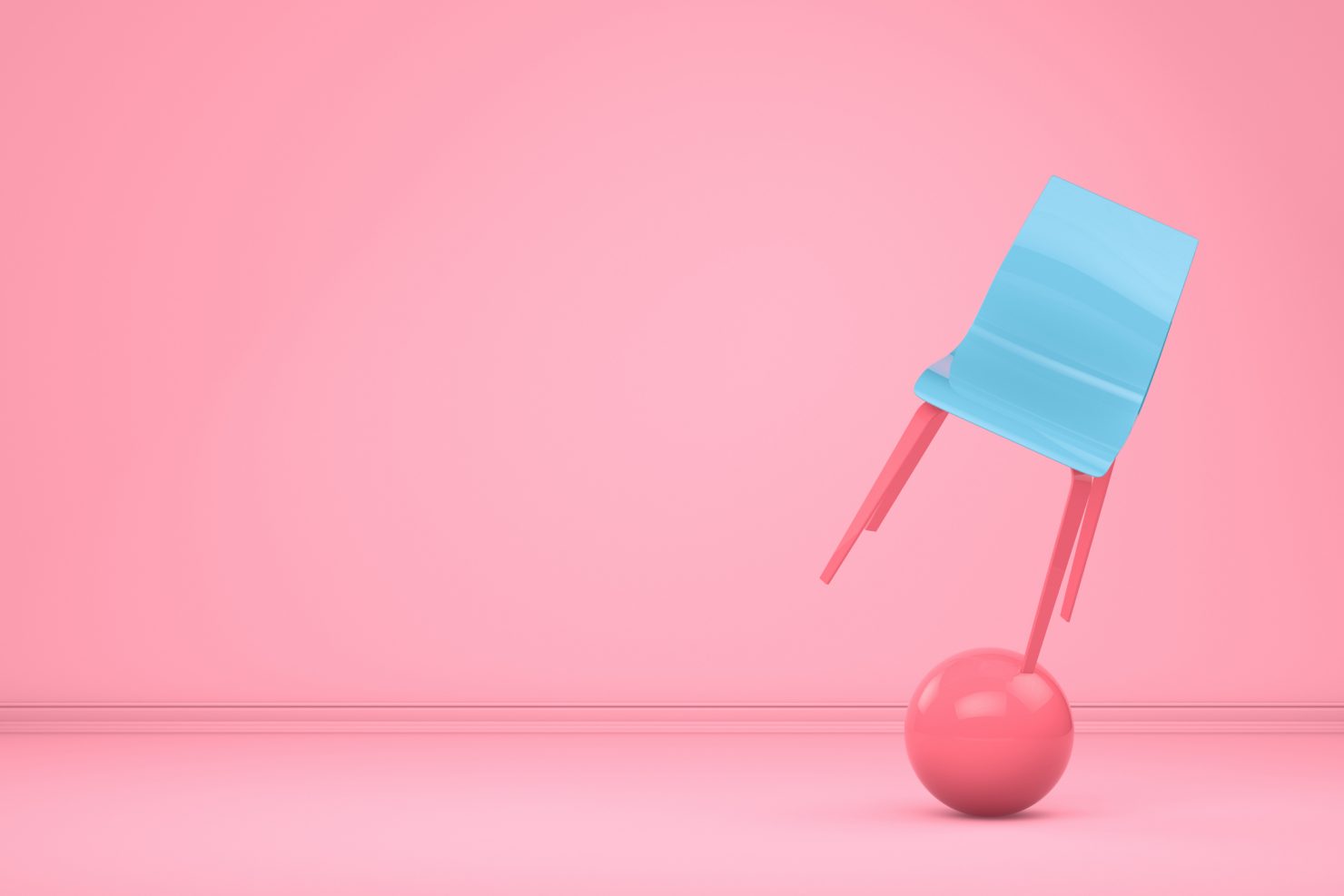 Picture of a blue and pink chair being balanced on top of an exercise ball to represent work-life balance.