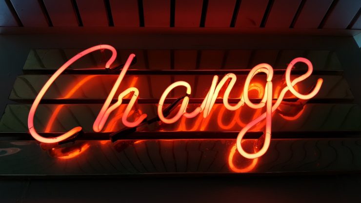 Neon sign that says Change