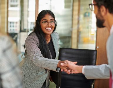 Woman accepting a job offer who had a great candidate experience